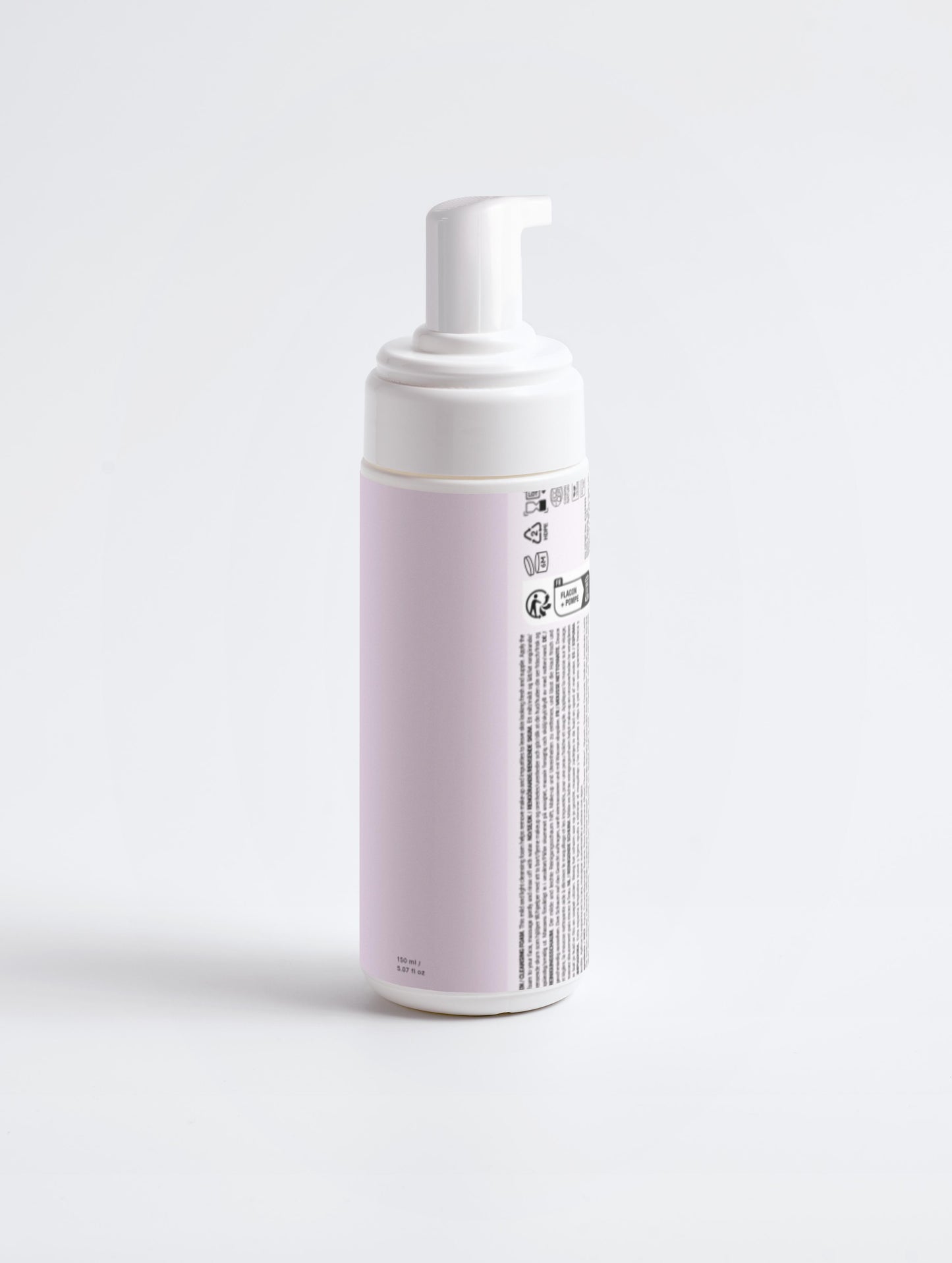 Foam bottle with a label on a light gray background