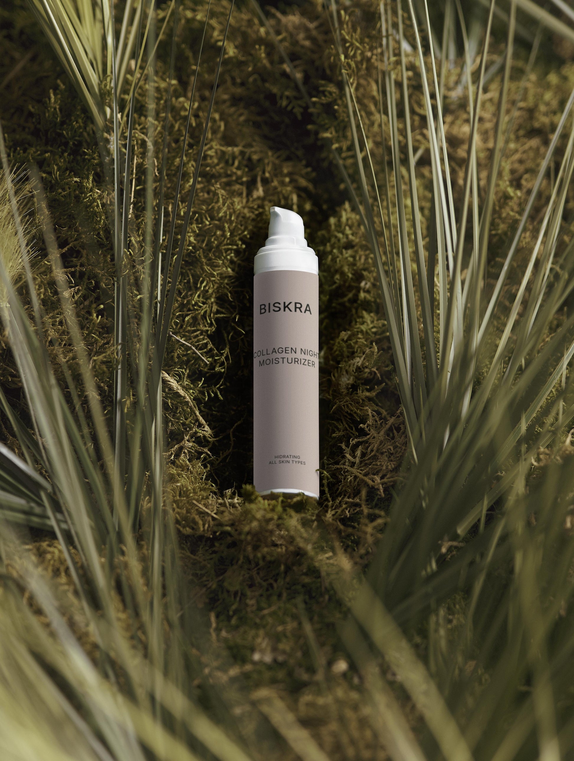 "Applying Collagen Night Moisturizer to face as part of evening skincare routine."