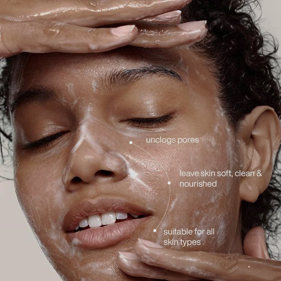 "Applying Hydra Mousse Face Cleanser in circular motion on wet skin."