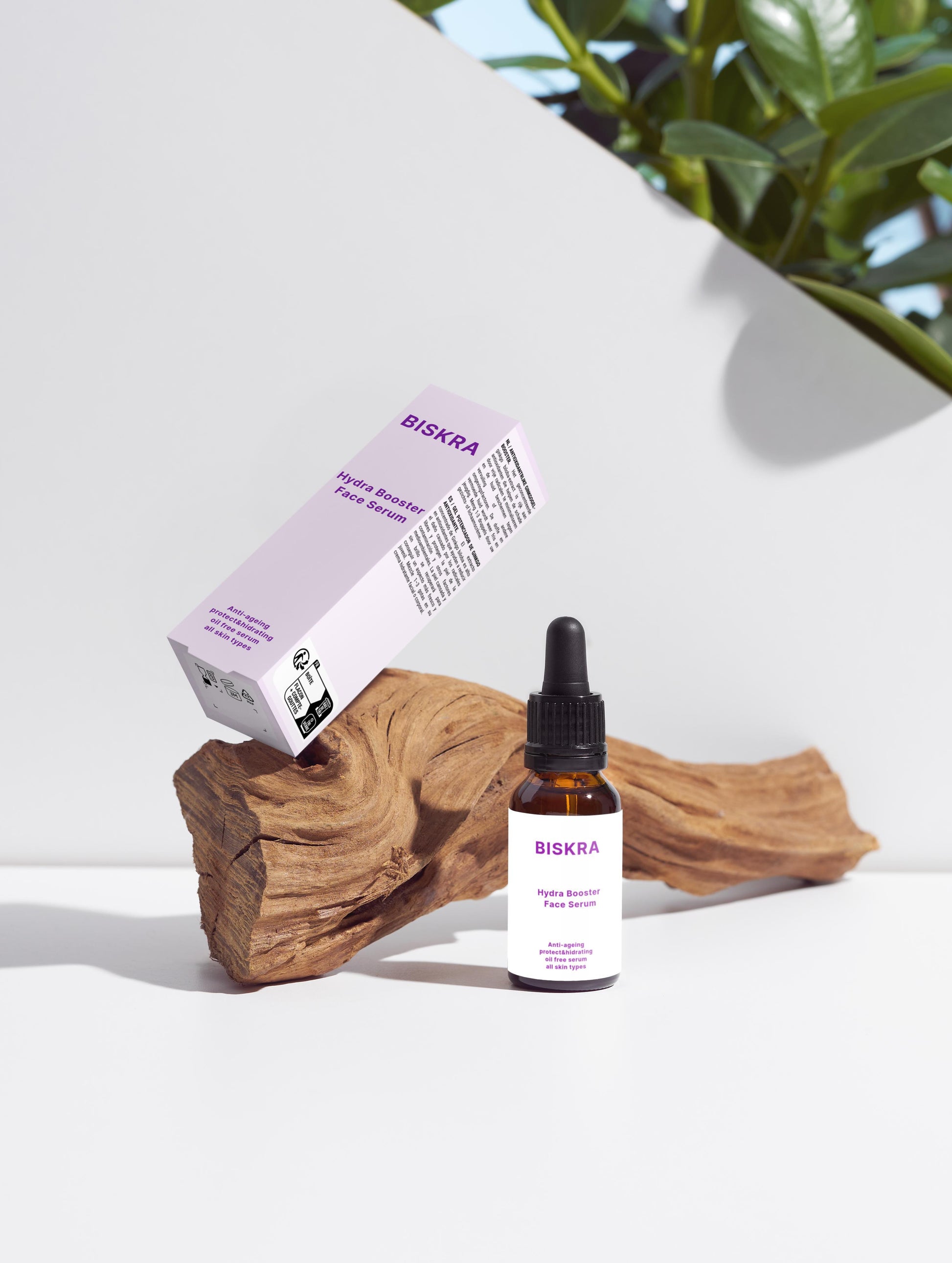 Biskra HIDRA BOOSTER serum surrounded by natural botanical extracts