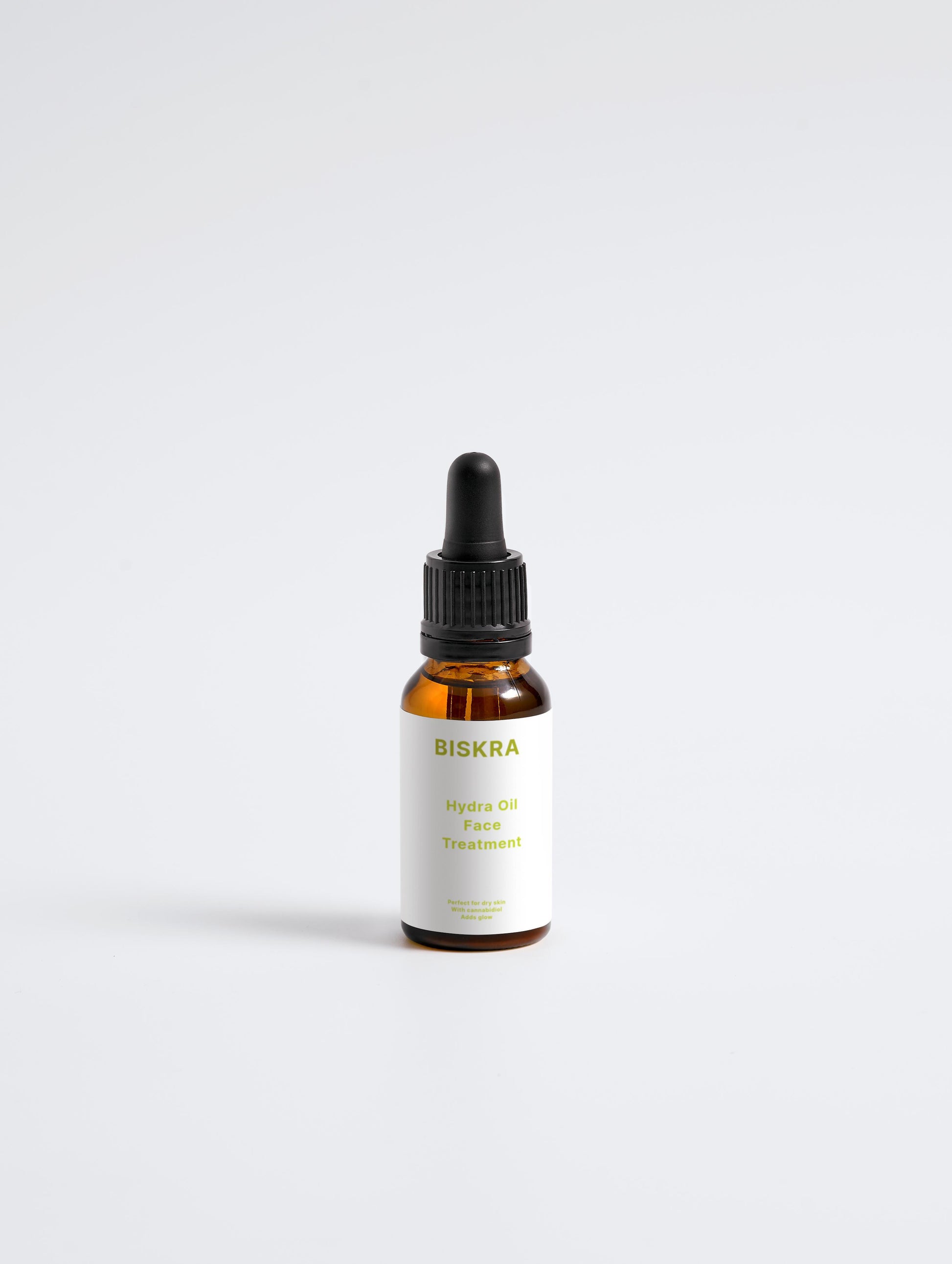Close-up of lightweight CBD facial oil texture on skin