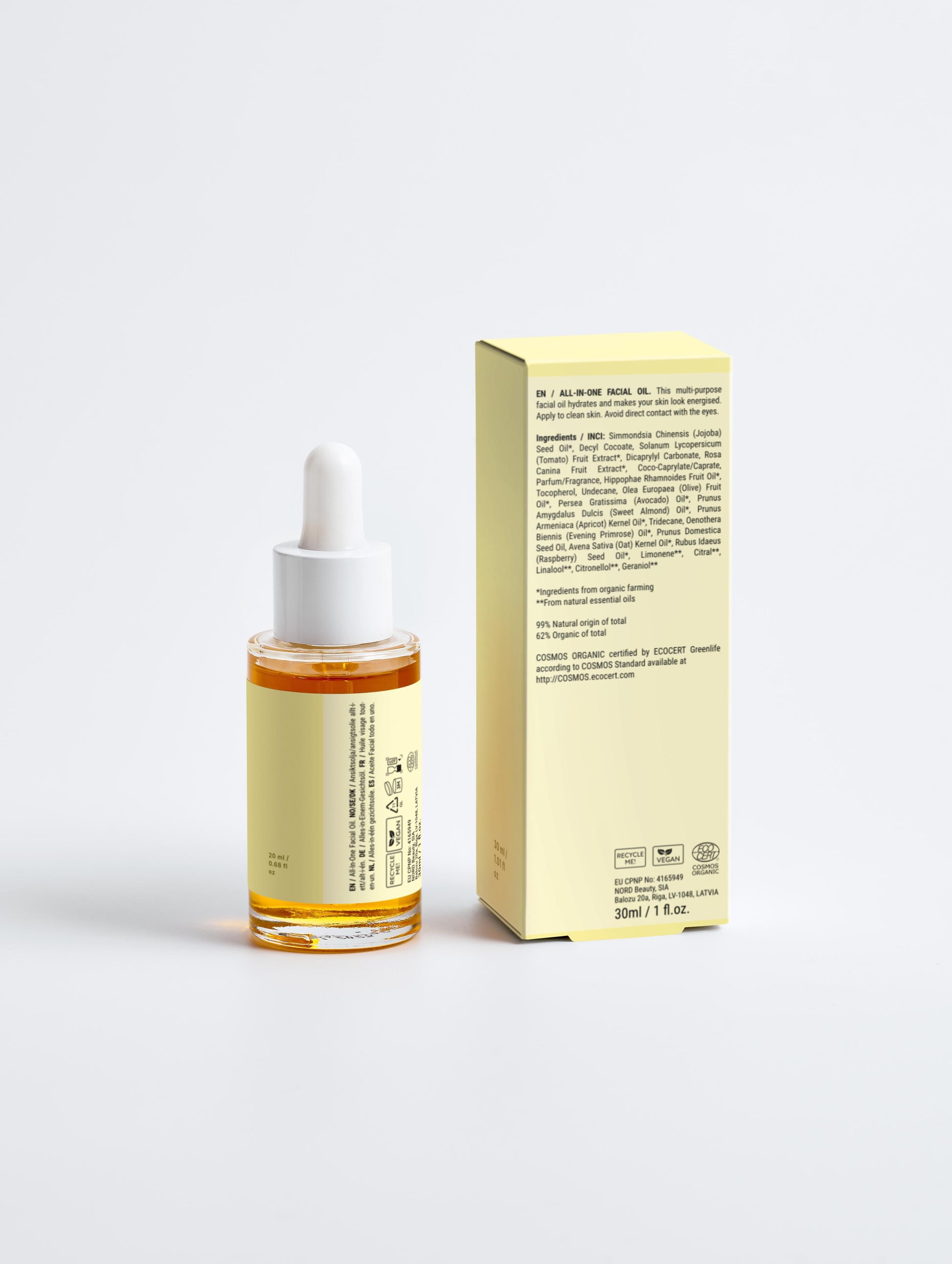 Flat lay of Essential Oils Hydra Booster with ingredients like jojoba and avocado