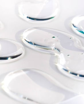Hydra Eye Revitalize Gel Serum being gently massaged into the delicate skin around the eyes.
