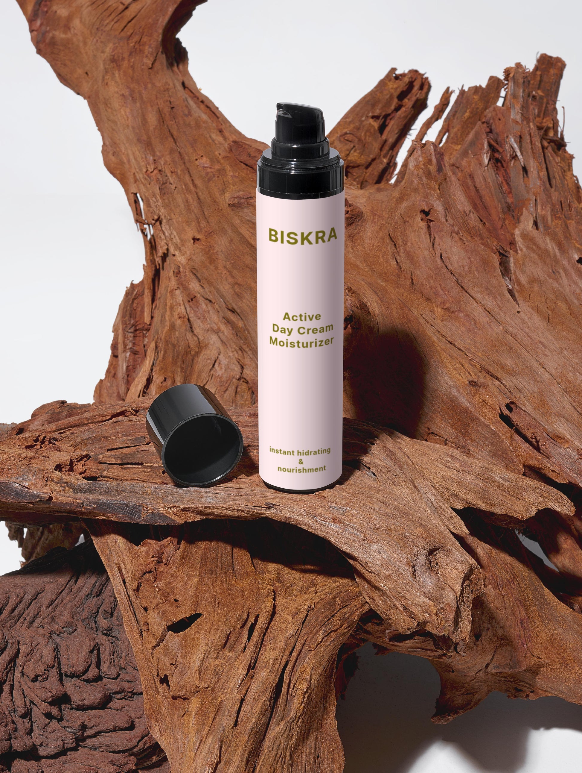 Jojoba and Rowanberry next to product bottle
