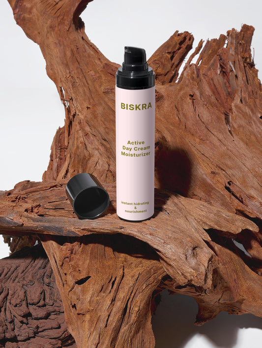 Jojoba and Rowanberry next to product bottle