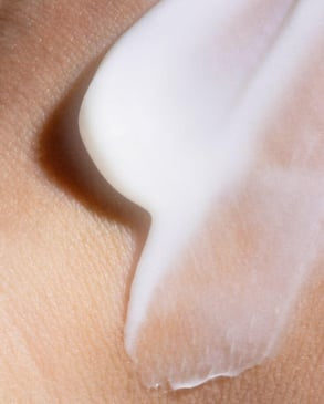 Radiant complexion of model after using moisturizer