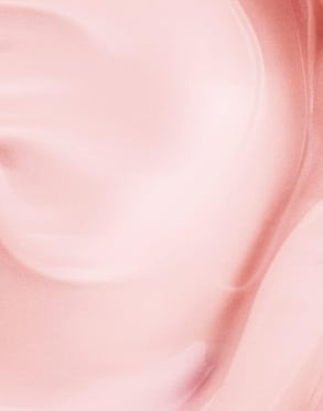 Serum drop on glass to showcase high-quality, clean beauty formulation